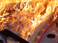 photo of a flaming piano