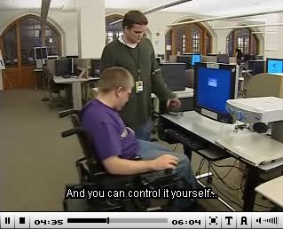 Snapshot of JW FLV Player with closed caption and audio description toggle buttons