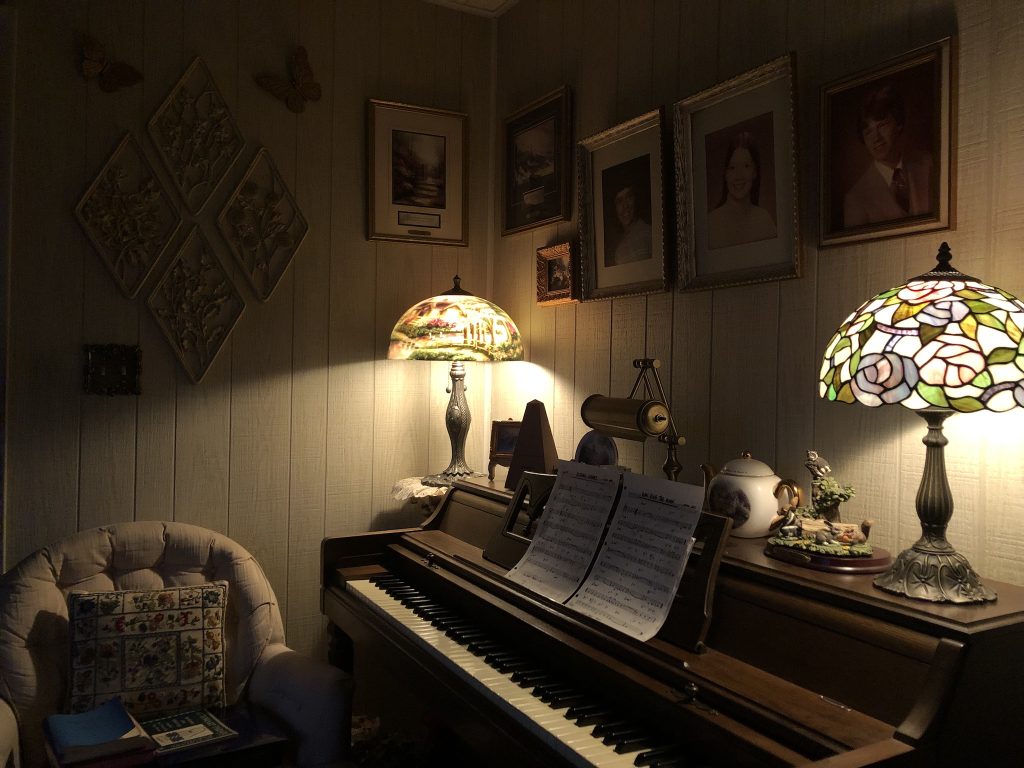 The piano in the dim evening light